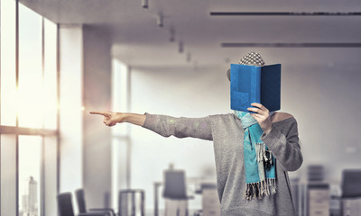 Student girl with book in hands