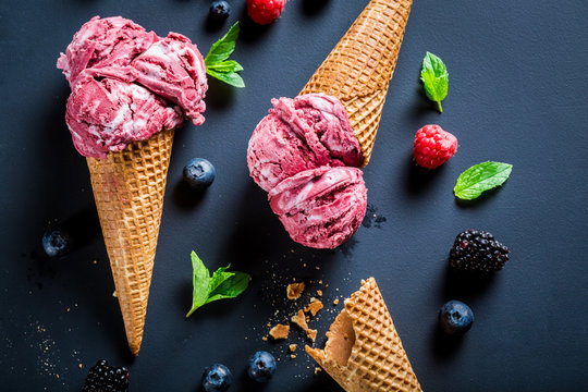 Sweet ice cream with berry fruits in waffels