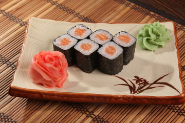 Japanese roll with wasabi sauce on plate