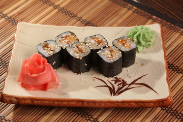 Japanese roll with wasabi sauce on plate