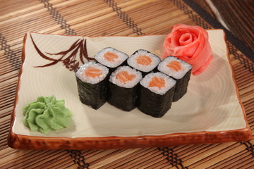 Japanese roll with wasabi sauce on plate