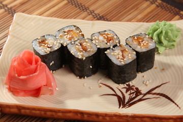 Japanese roll with wasabi sauce on plate