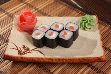Japanese roll with wasabi sauce on plate