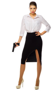 Businesswoman with gun isolated