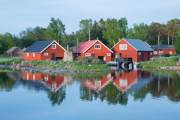 Fototapeta na wymiar Fisherman cabins on the est coast in Sweden