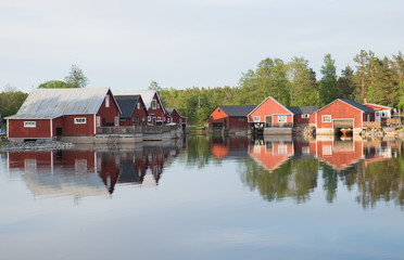 Fototapeta na wymiar Fisherman cabins on the est coast in Sweden