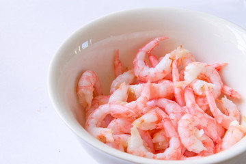 the shrimp in the bowl closeup on white background