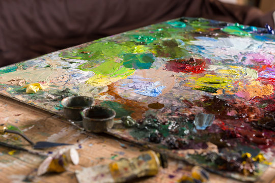 Painter's palette with oil paints