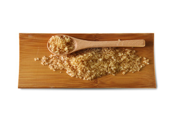 Natural Brown Sugar in Bamboo Plate Isolated on White Background