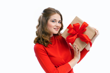 Joyful woman holding a box with gift