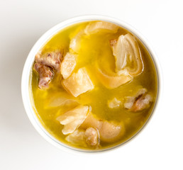 The bowl with boullion.