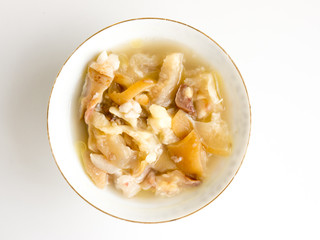 The bowl with boullion.