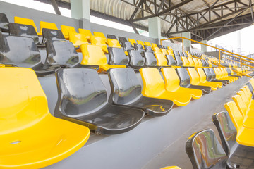 empty chairs and walkway in football stadium
