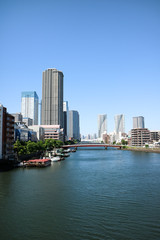 Fototapeta na wymiar High-rise buildings of Harumi and river(Japan)
