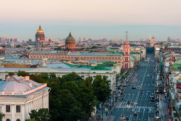 Fototapeta na wymiar View of the Nevsky Prospekt morning without cars in St. Petersburg from height. On the horizon you can see St. Isaac's Cathedral and Kazan Cathedral.