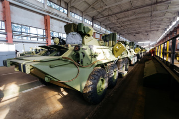 Russian armored personnel carrier with a weapon in the hangar.
