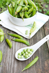 Fresh green peas in pods
