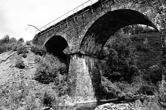 Fototapeta Railroad bridge. Black and white photo.ч