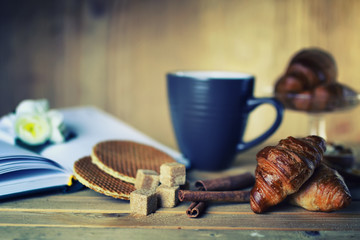 tea cup croissant book