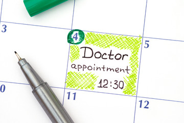 Reminder Doctor appointment 12-30 in calendar with pen