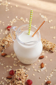 Jug of milk with straw