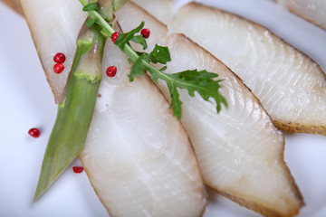 Fresh white fish with salad