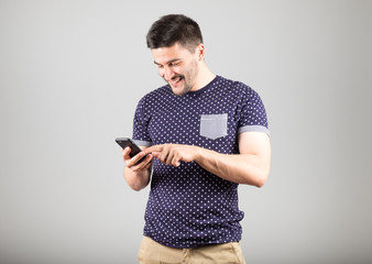 Young man using his smartphone