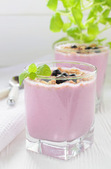 Berry milk smoothie with muesli