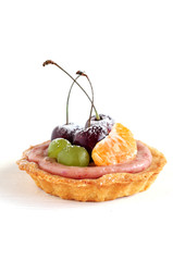 Single fruit mini tart on white