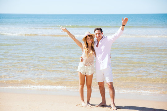 Hispanic couple in their honeymoon at the beach