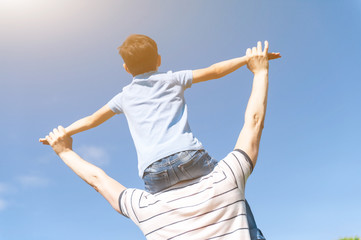 Cute grandson and grandparent are enjoying the son