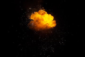 Realistic fiery explosion over a black background