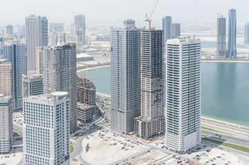 Aerial view of Sharjah skyscrapers, UAE