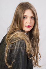 Fototapeta premium stylish girl with long beautiful hair in studio