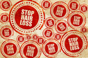 stop hair loss, red stamp on a grunge paper texture