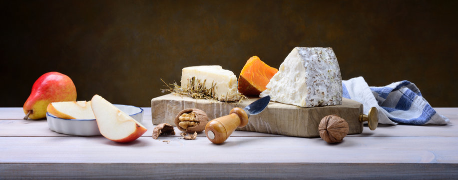 Cheese aged in hay, Mimolette cheese, Toma Brusca cheese with pears and walnuts