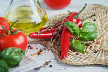 Italian food background, with tomatoes, basil, olive oil, pepper