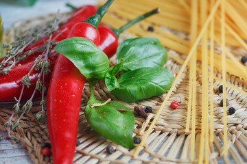 Italian food background, with  tomatoes, basil, spaghetti, olive