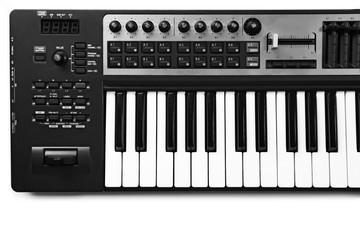 Fototapeta na wymiar Keyboard of synthesizer closeup
