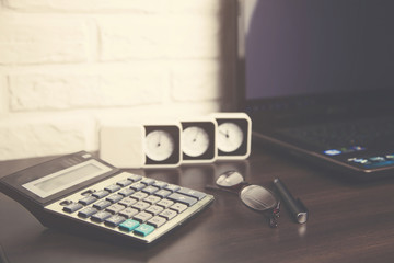 computer and calculator  on table