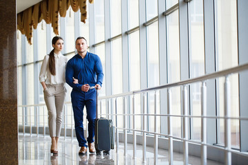 Couple in love on vacation. Couple standing in the airport.