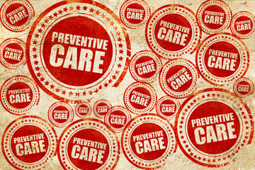 Obraz premium preventive care, red stamp on a grunge paper texture