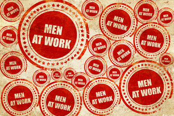 men at work, red stamp on a grunge paper texture