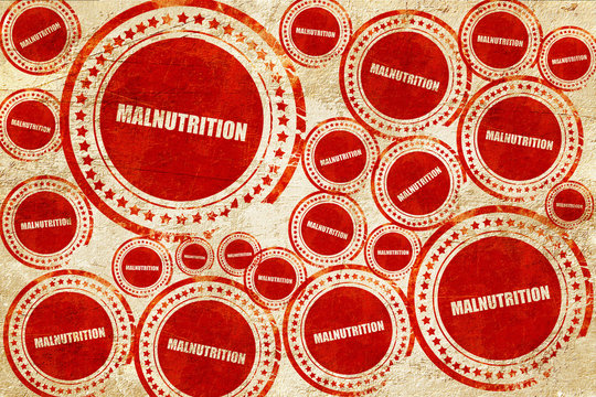 Malnutrition, Red Stamp On A Grunge Paper Texture