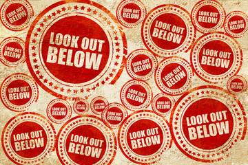 Obraz premium look out below, red stamp on a grunge paper texture