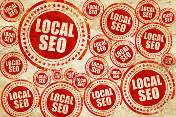Obraz premium local seo, red stamp on a grunge paper texture