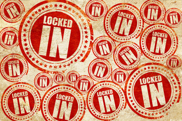 locked in, red stamp on a grunge paper texture