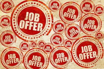 job offer, red stamp on a grunge paper texture