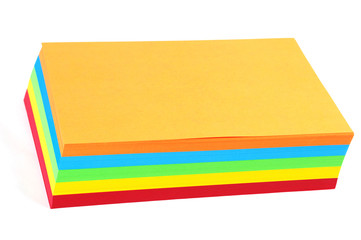 Fototapeta premium stacking colored papers isolated in white background