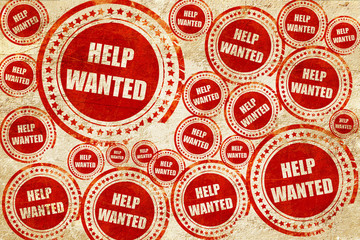 Help wanted sign, red stamp on a grunge paper texture